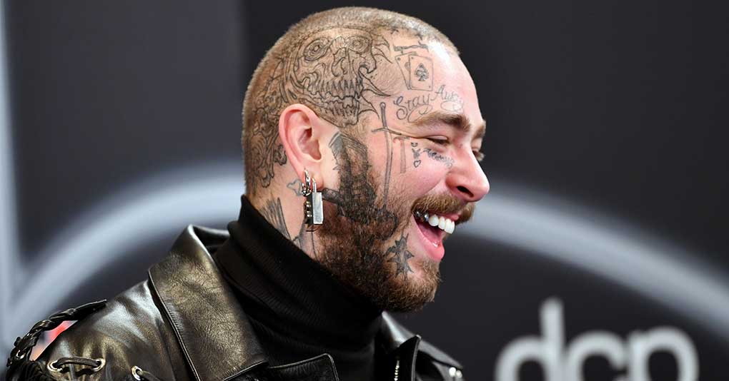 Post Malone poses backstage at the 2020 Billboard Music Awards