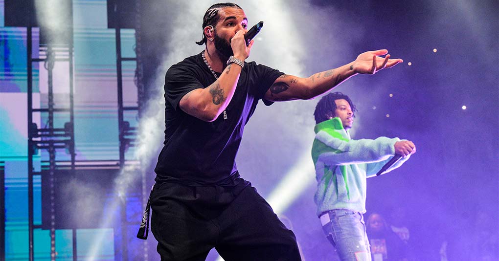 Drake and 21 Savage perform onstage during