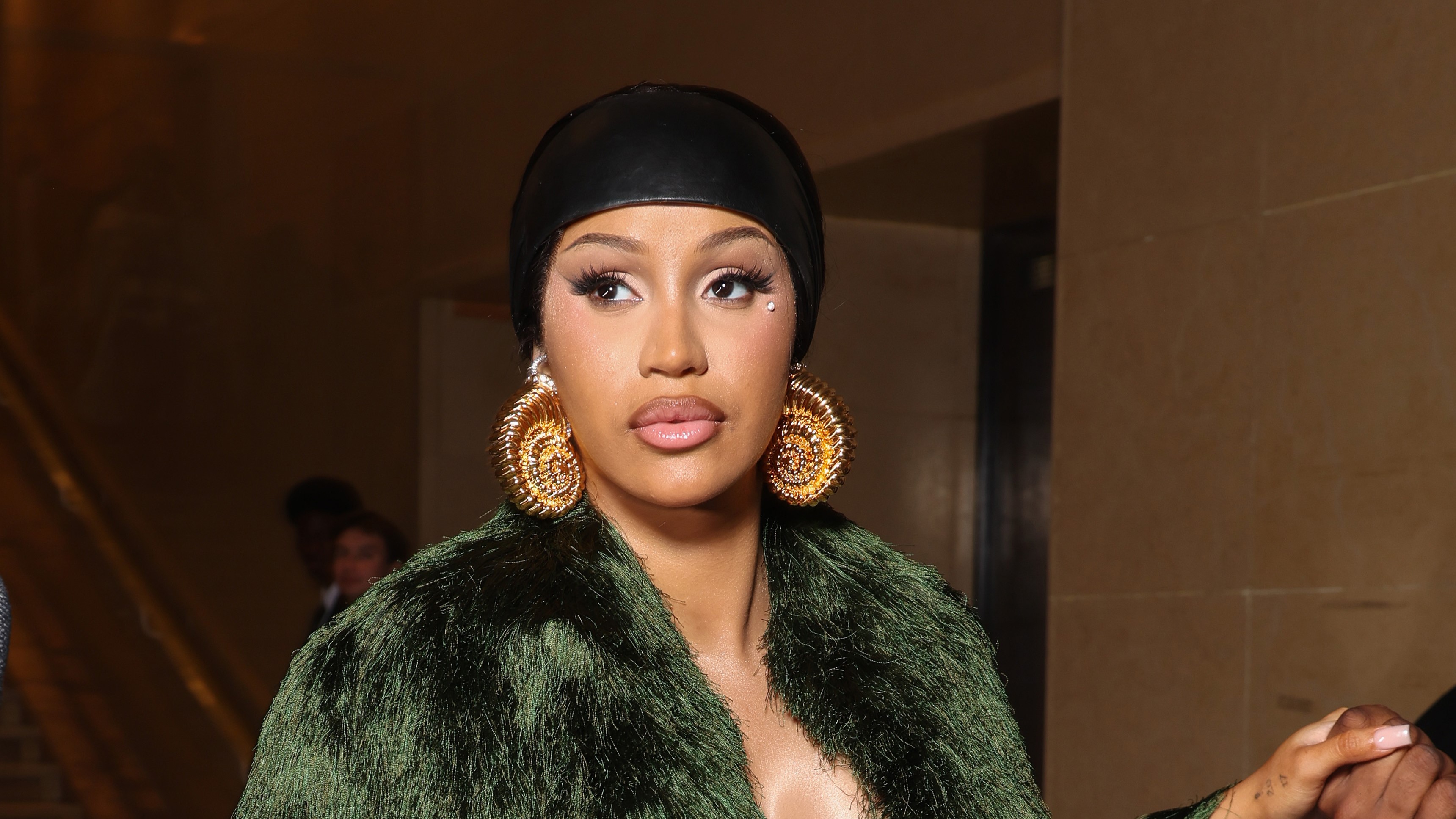 Cardi B Claps Back at Prank Caller After CPS Visit to Her Home thumbnail