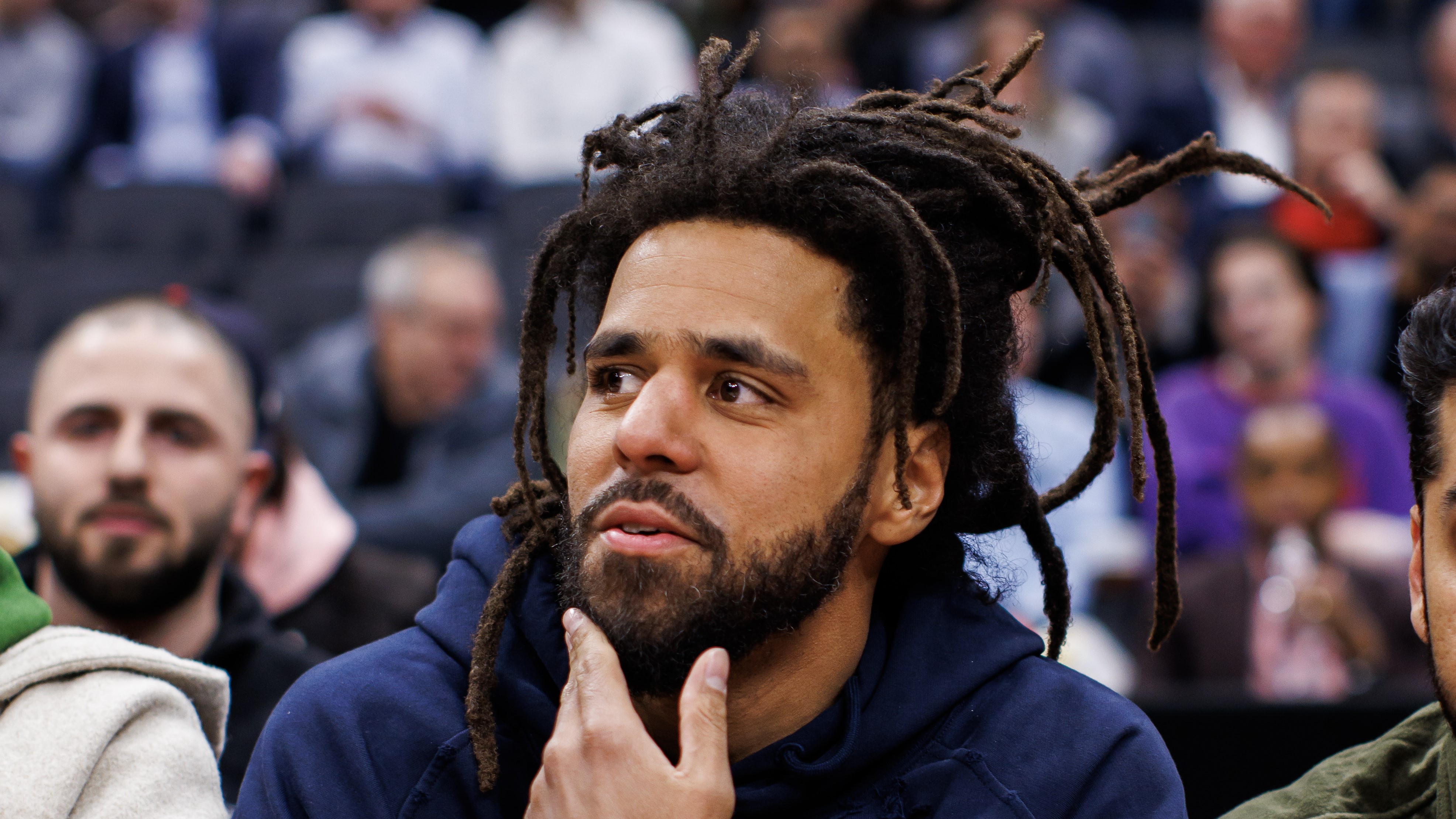 J. Cole Challenges the Readiness of the Music Industry for AI in New Track "cLOUDs" thumbnail