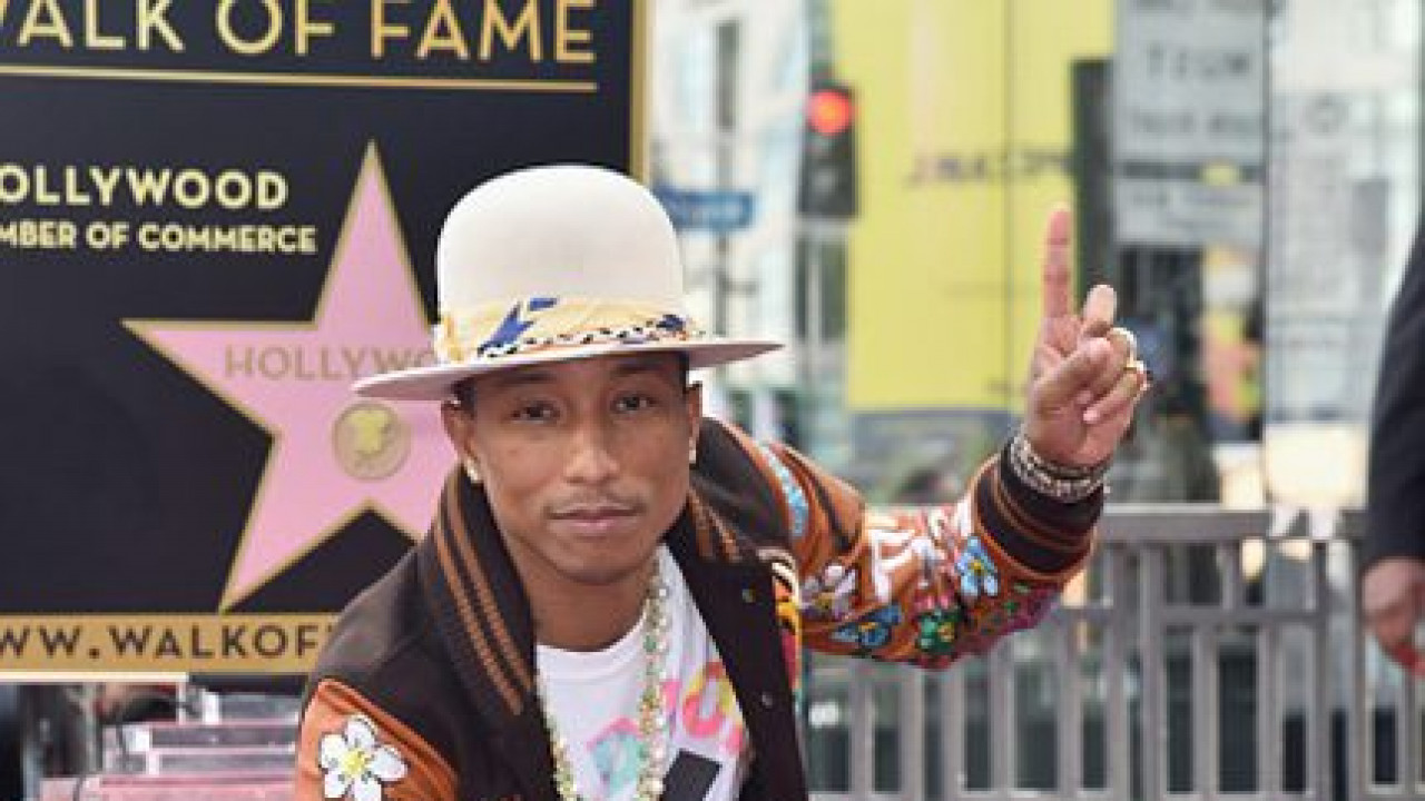 Los Angeles, CA, USA. 4th Dec, 2014. Pharrell Williams, Family at the  induction ceremony for Star on the Hollywood Walk of Fame for Pharrell,  Hollywood Boulevard, Los Angeles, CA December 4, 2014.